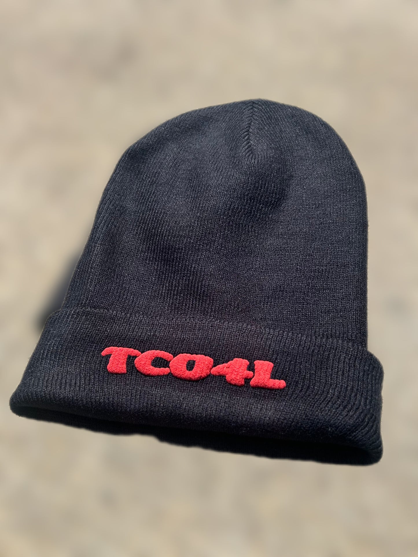 TCO4L Beanie – Limited Edition (Black with White or Red Lettering)