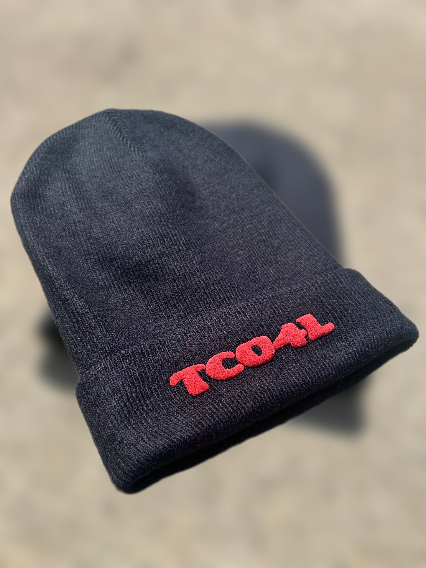 TCO4L Beanie – Limited Edition (Black with White or Red Lettering)