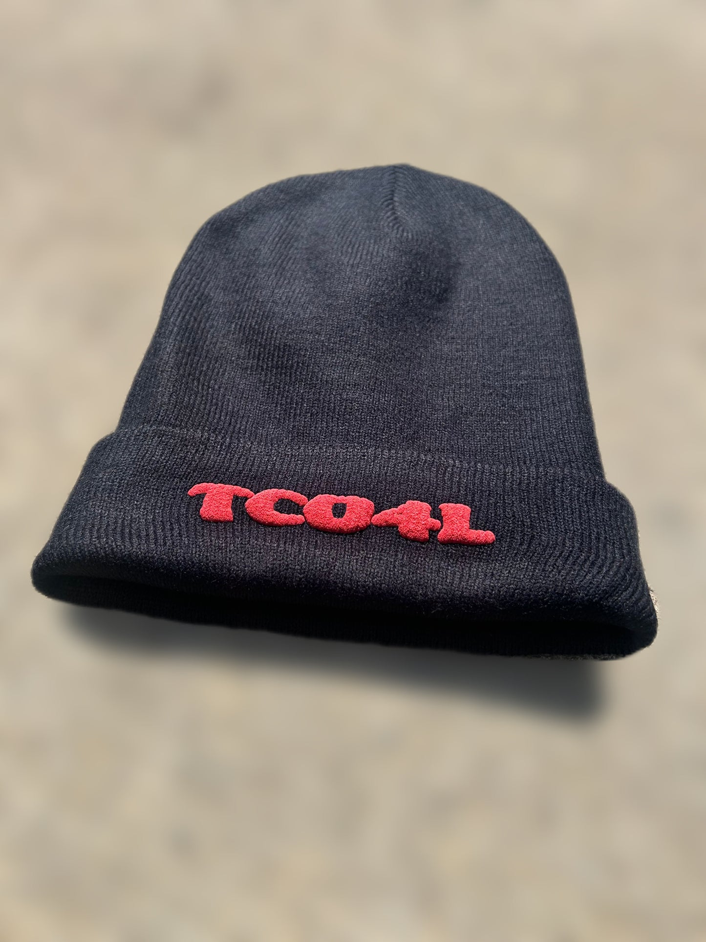 TCO4L Beanie – Limited Edition (Black with White or Red Lettering)