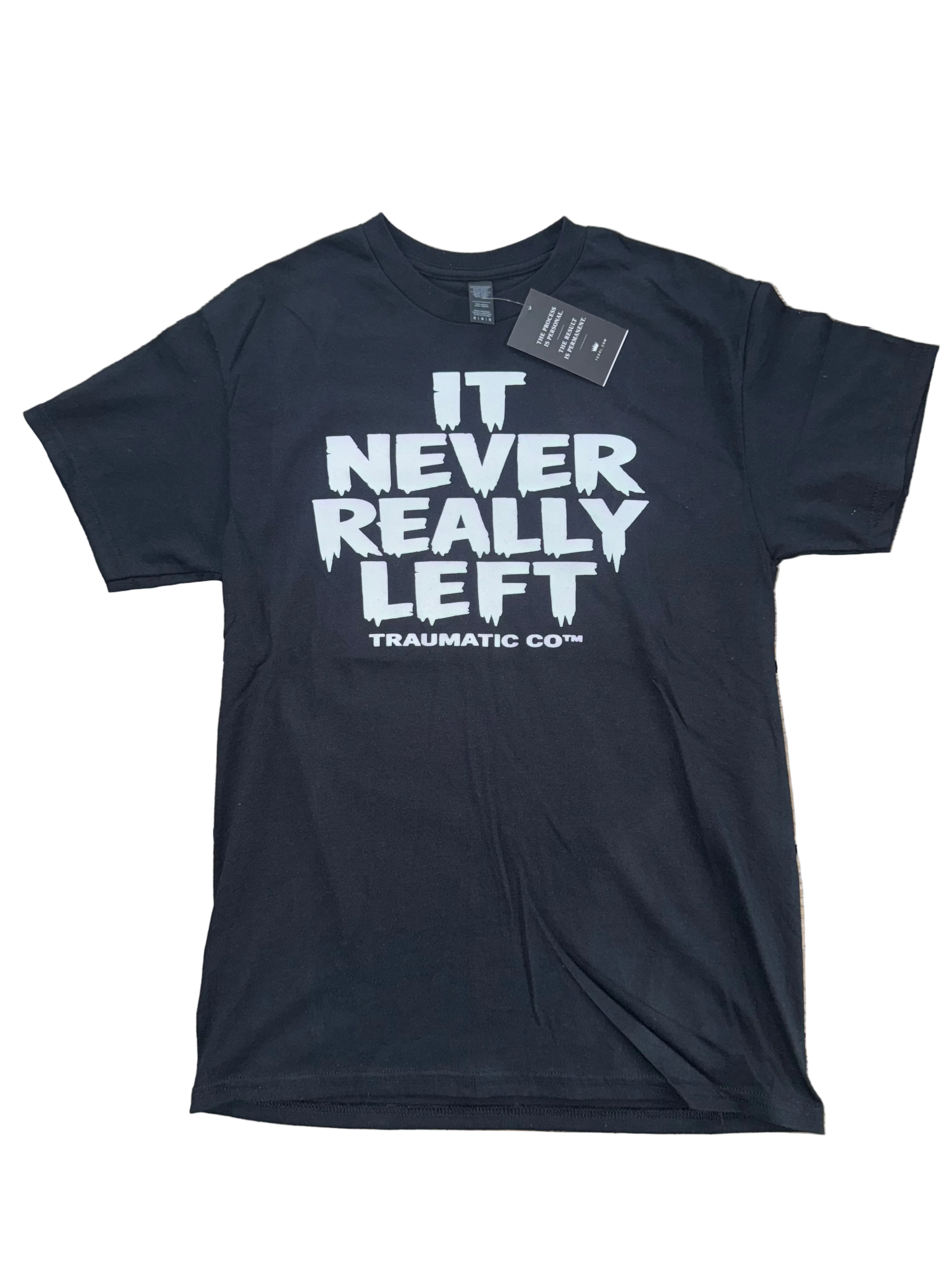It Never Really Left | Traumatic Co ™ | Tee